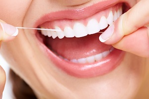 Learning How To Floss With Your Eyes Closed Can Keep Your Mouth Healthy