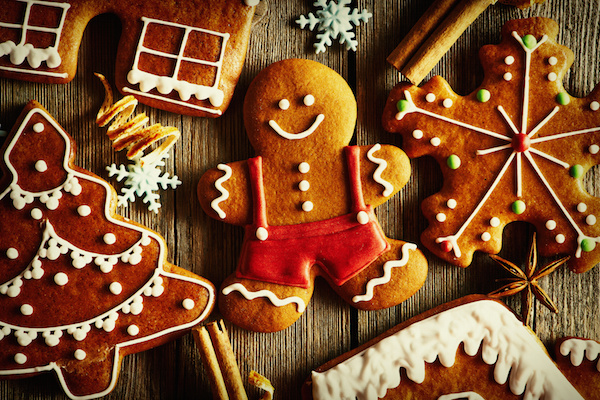 Christmas homemade gingerbread cookies on wooden table