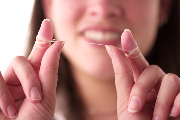 Woman ready to floss