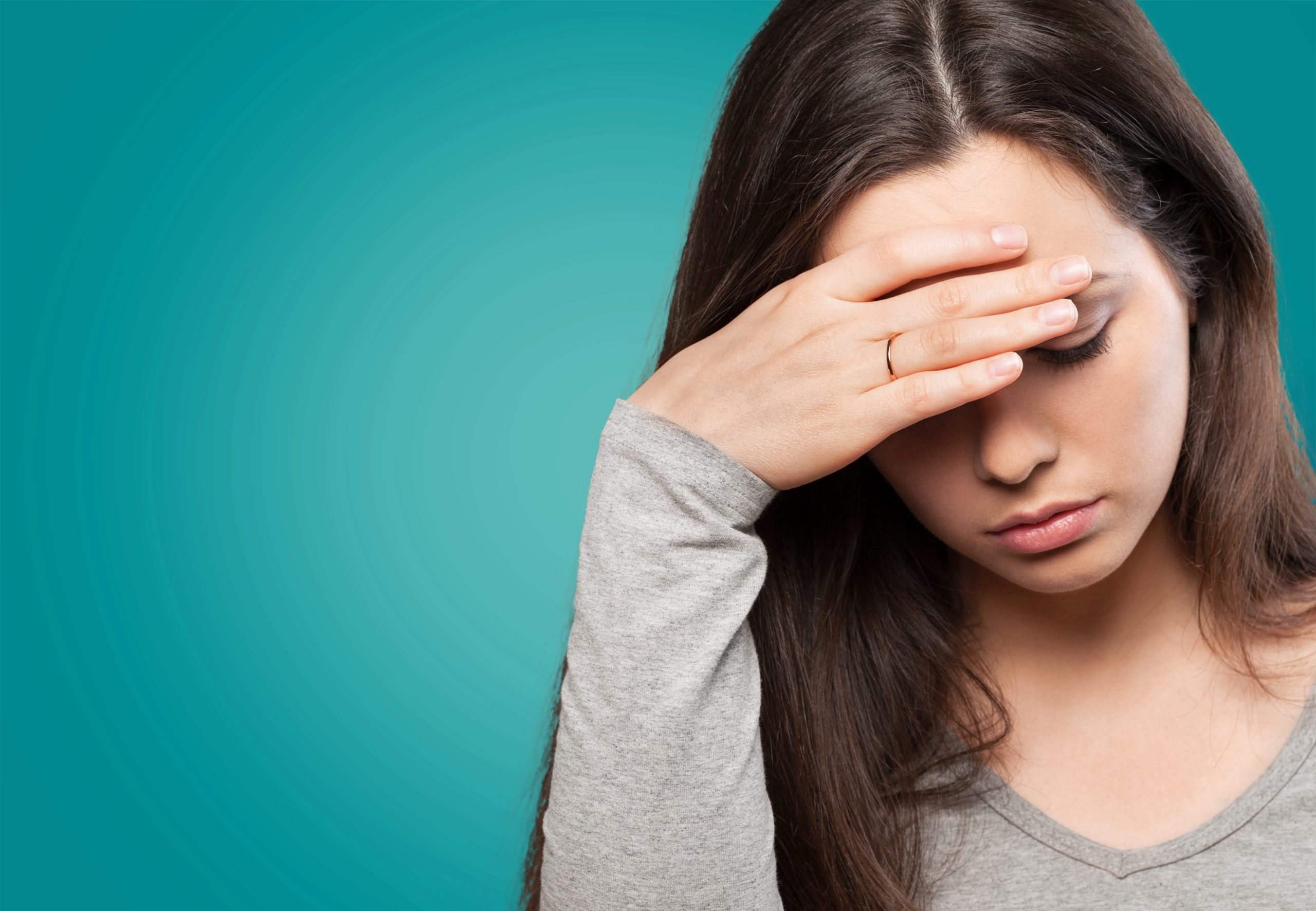 Brunette woman with anemia not feeling well. treatment