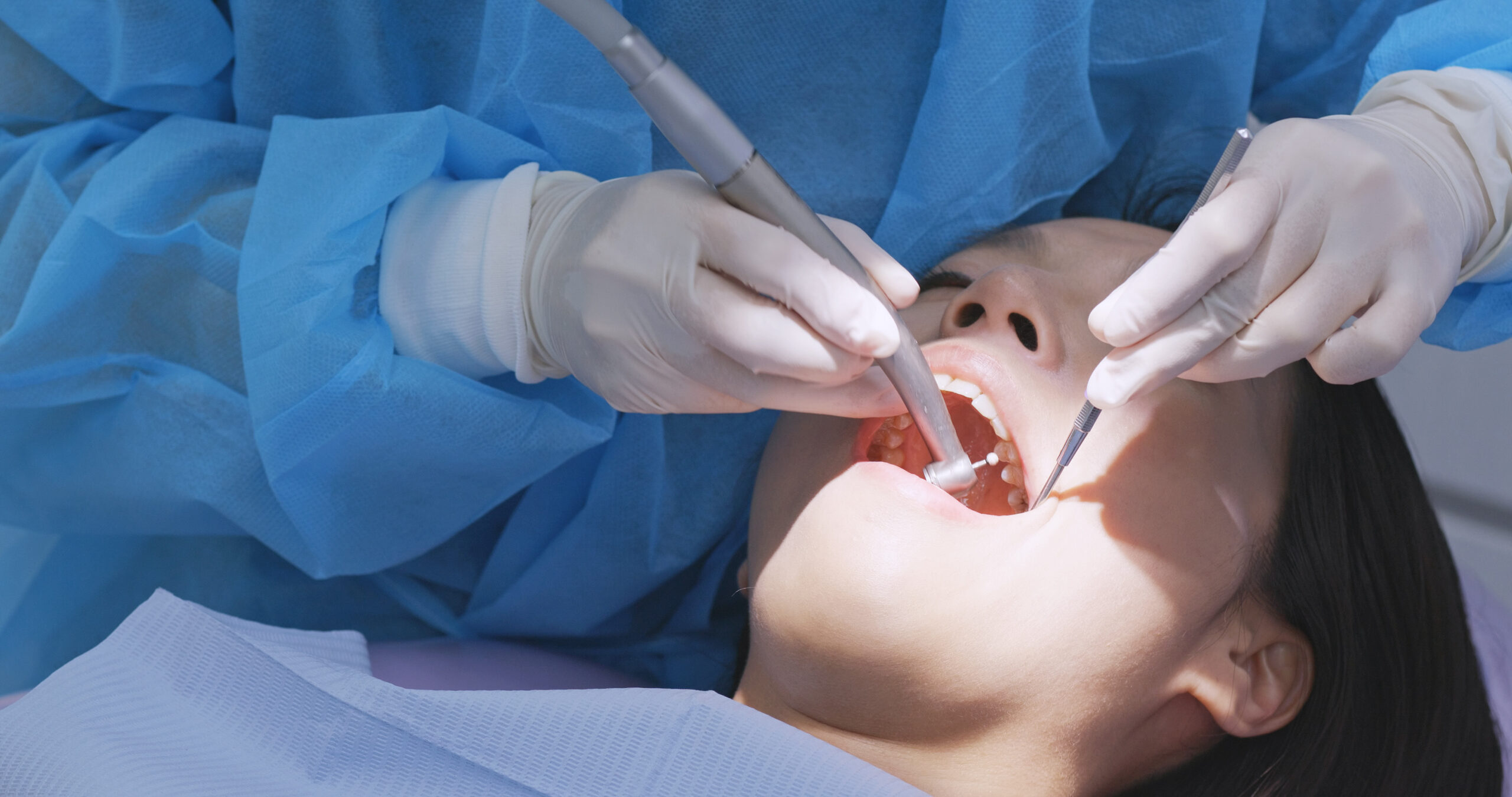 tooth removal Woman undergo dental check up