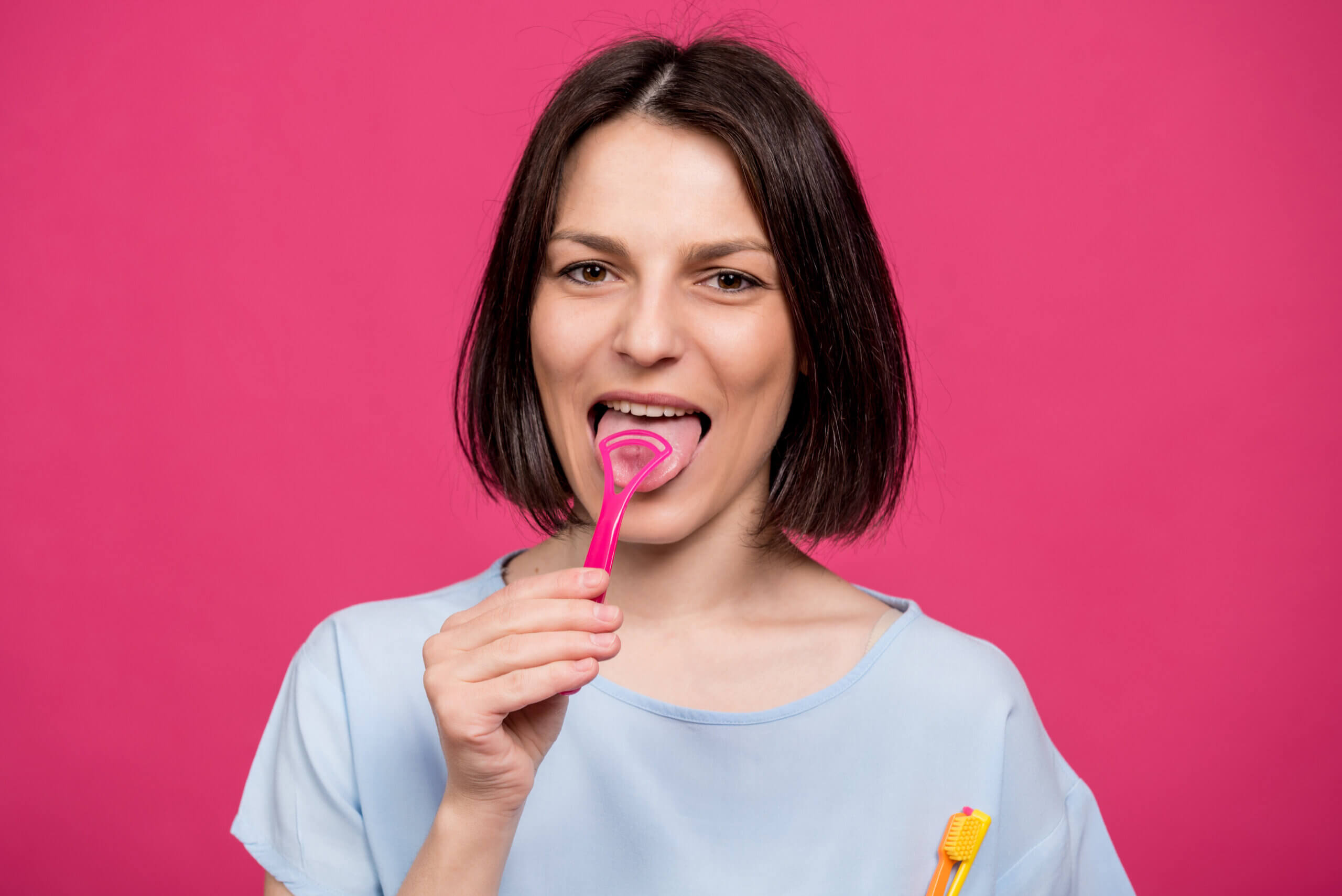 Tongue Scraping: Benefits & How To Do It